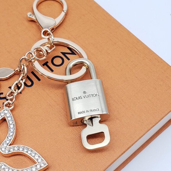 Authentic Louis Vuitton Gold Lock & Box w/ Unbranded Clover Bagcharm - Picture 7 of 9